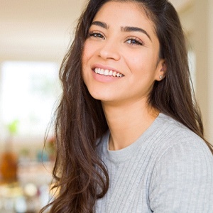 Woman with dental crown in Homer Glen smiling