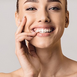 patient smiling after maintaining gum health