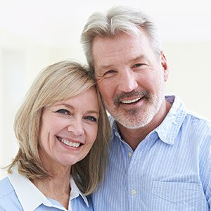 Senior man and woman smiling