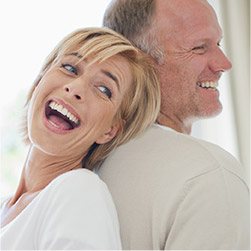 Man and woman smiling together