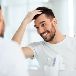 Man looking at smile in Homer Glen