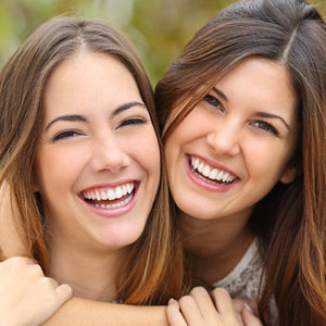 Two women smiling