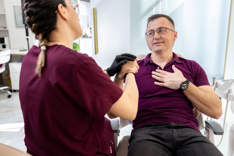 Patient talking with dentist about anxiety